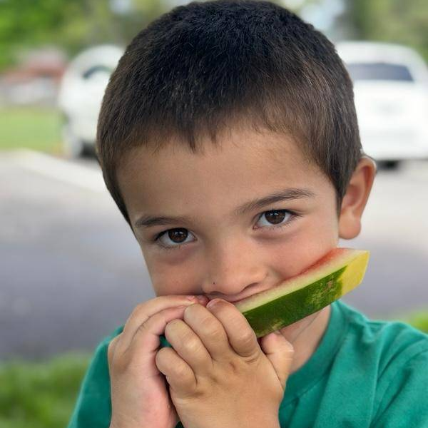 Boy Eating Watermelon