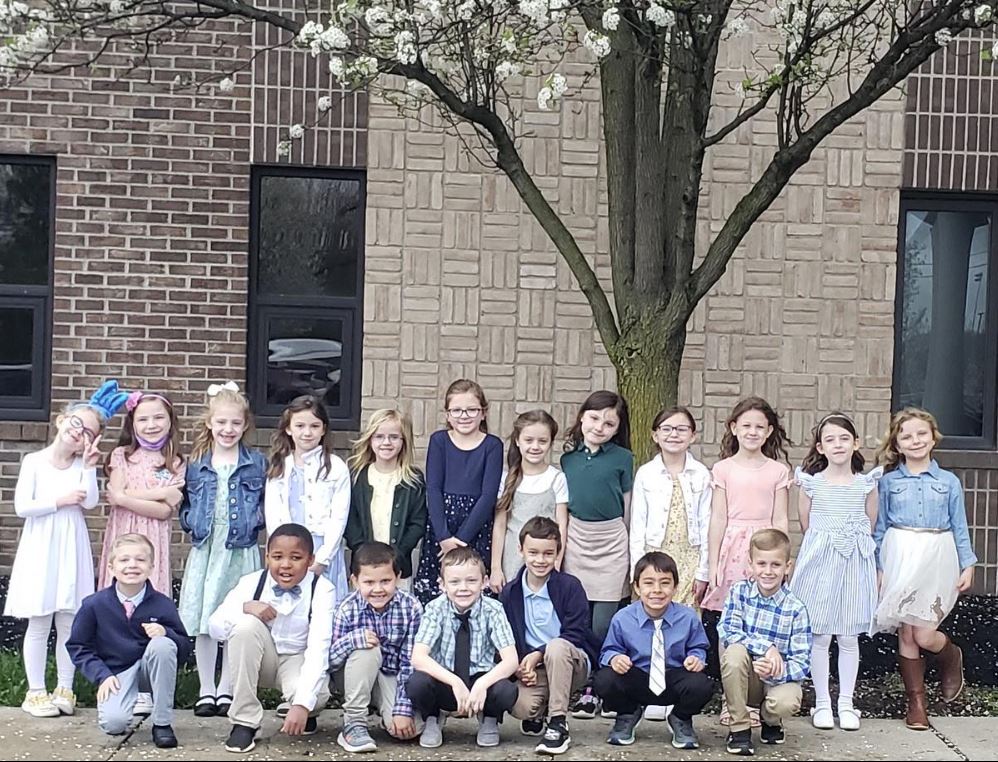 First grade students dress up for a special day for Easter.
