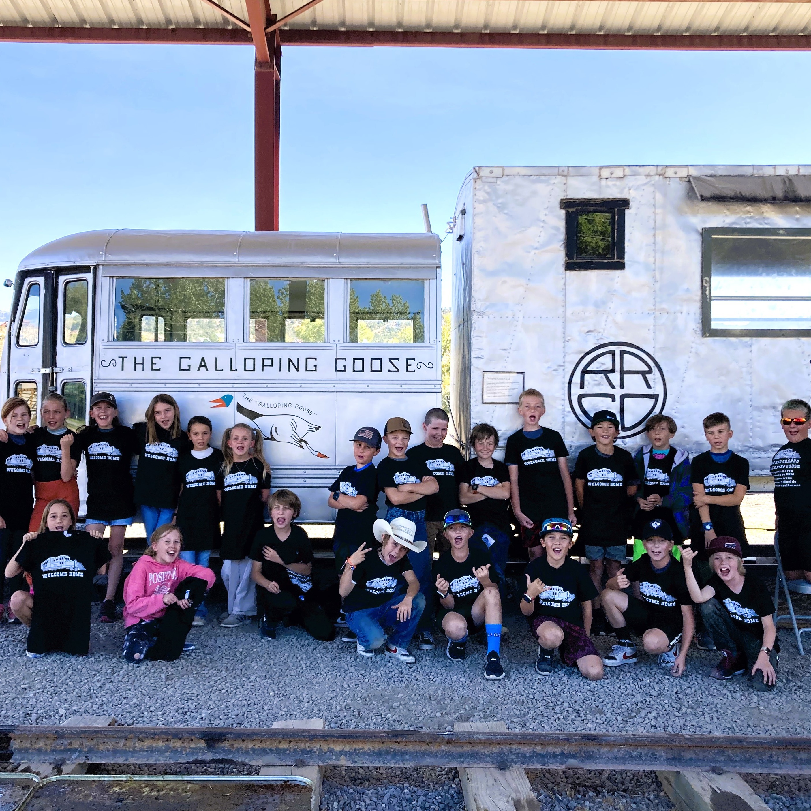 4th grade group photo in front of the Galloping Goose train