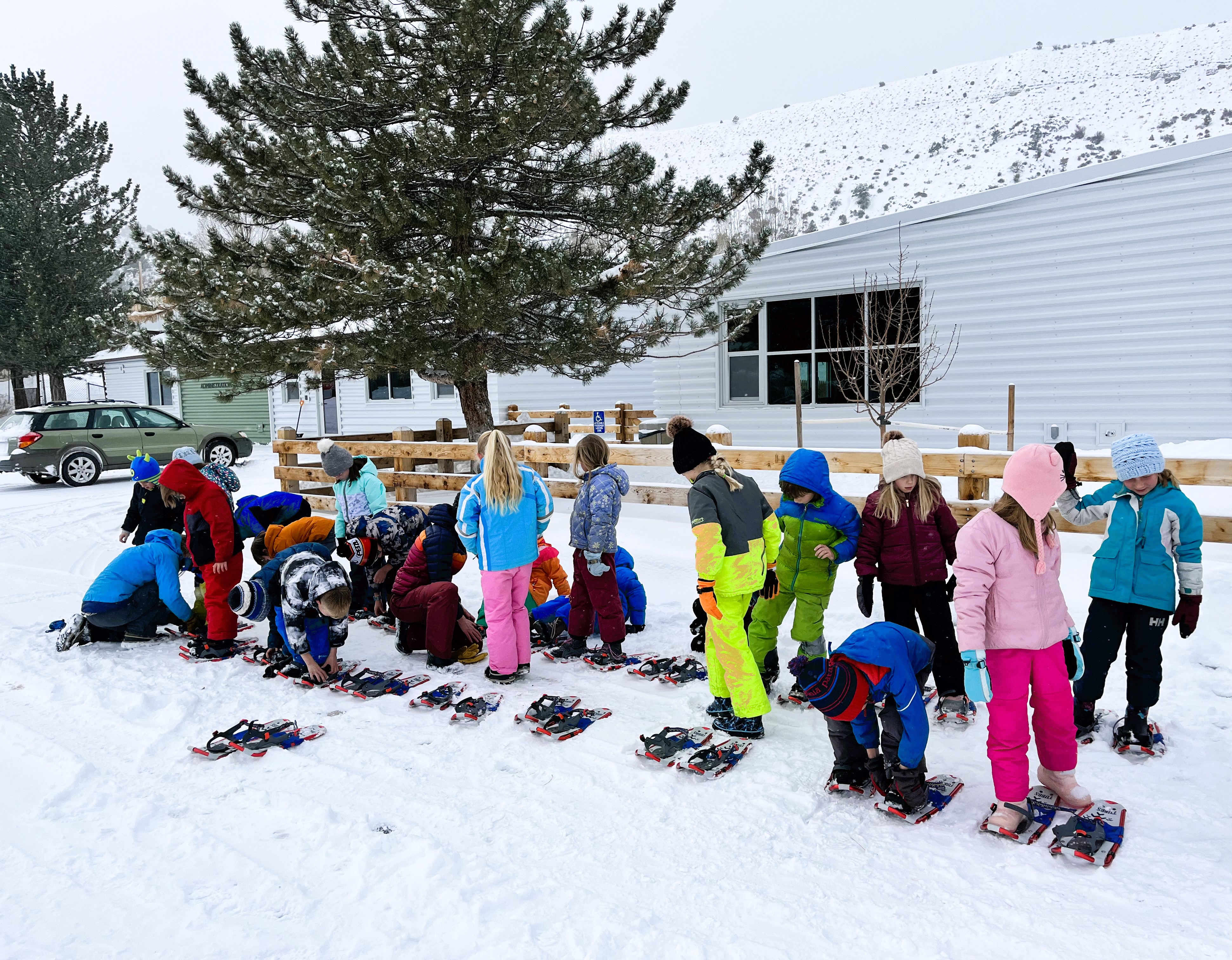 2nd grade P.E. class snowshoeing