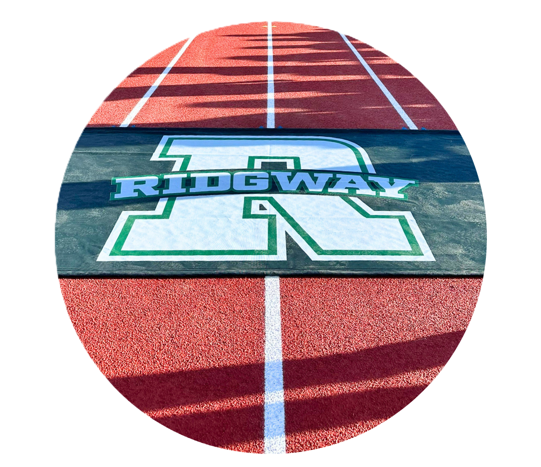 “Ridgway” logo on a track surface with lane lines.