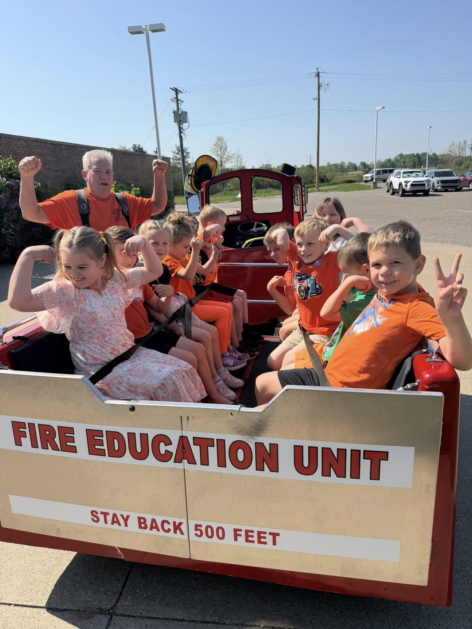 Palms Students on a mini fire truck