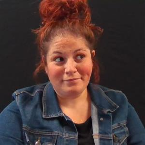 Photo of Emily Kimmel-Kurtz wearing a jean jacket.