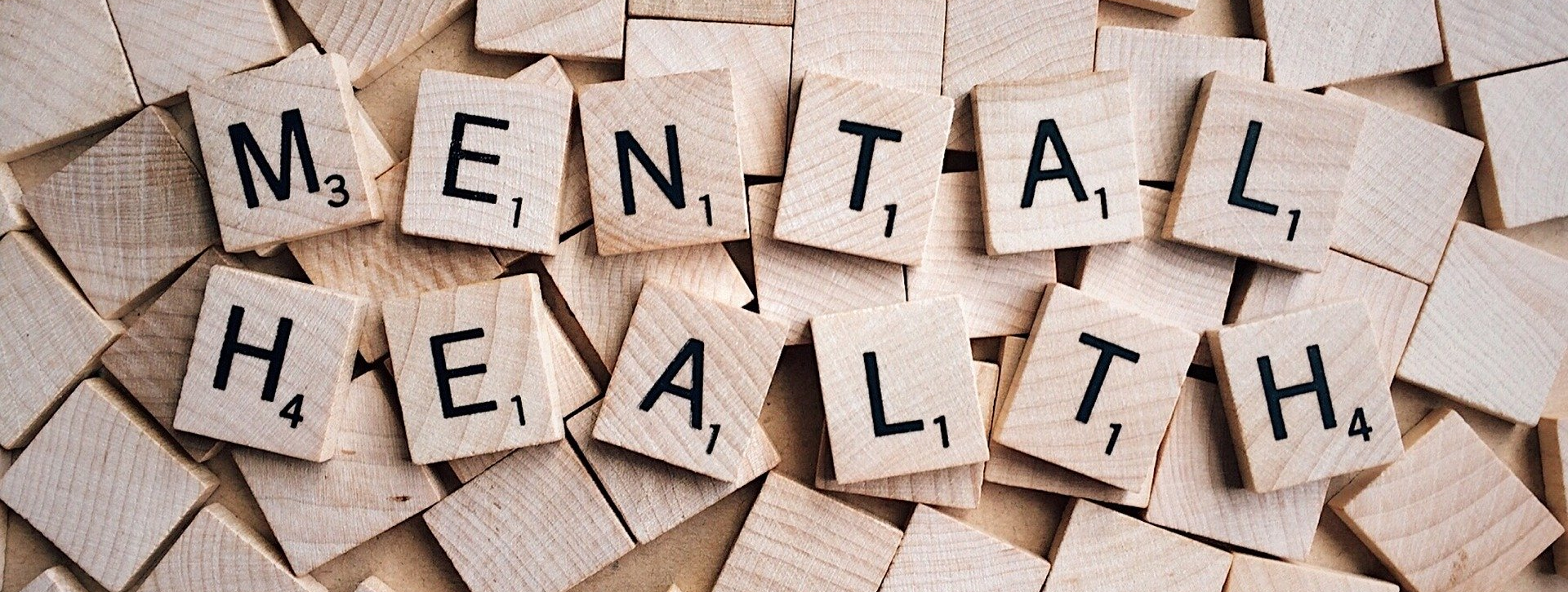 Scrabble Letters spelling the words "Mental Health"