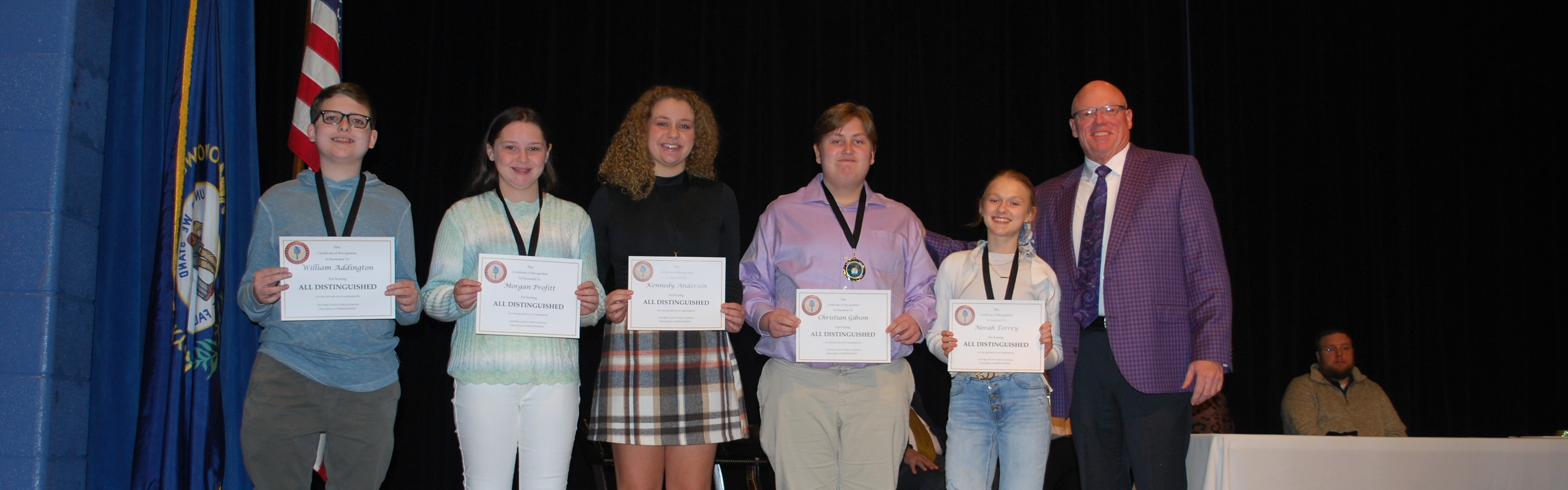 Fleming Neon students receiving all distinguished test awards.