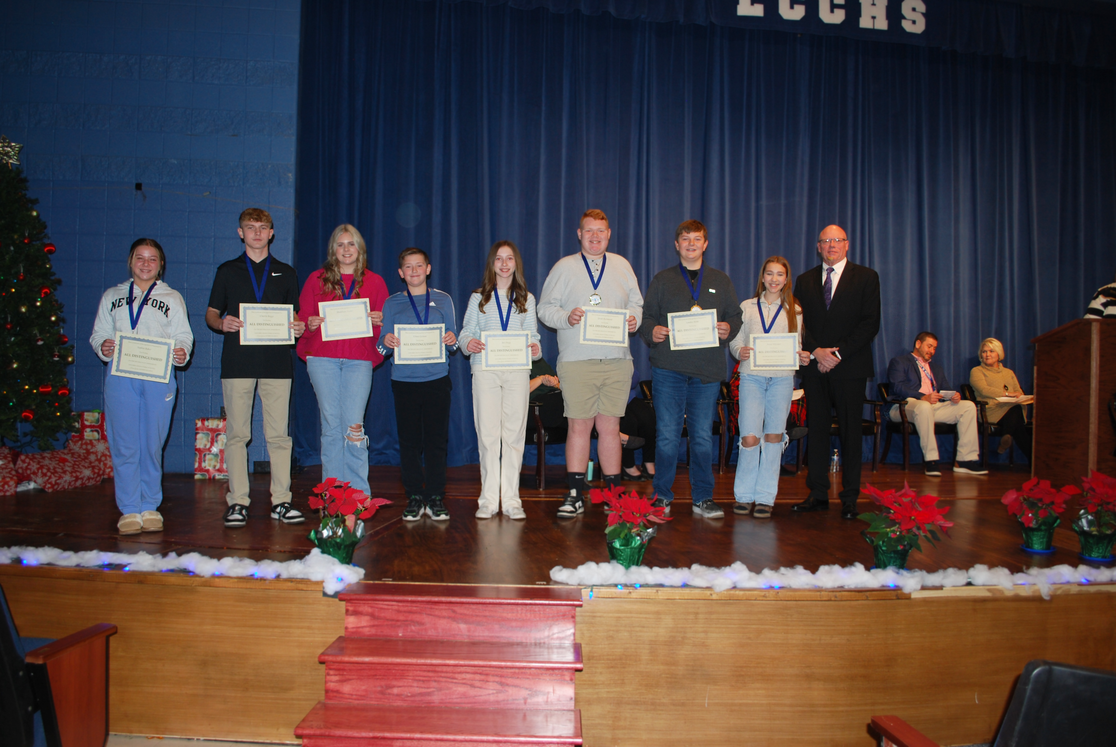 Neon students receiving certificate for scoring all distinguished on 23-24 Kentucky Assessment.