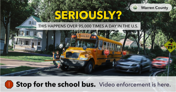 Stop for the School Bus.  Video Enforcement is Here. Image: School bus stopped, students exiting bus while car passes bus. This happens over 95,000 times a day in the U.S.