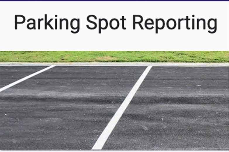 Picture of parking space with "Parking Spot Reporting"