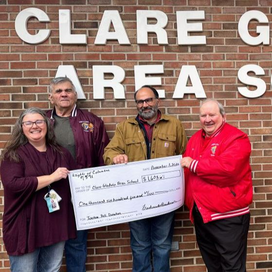 Area School receives donation from Knights of Columbus