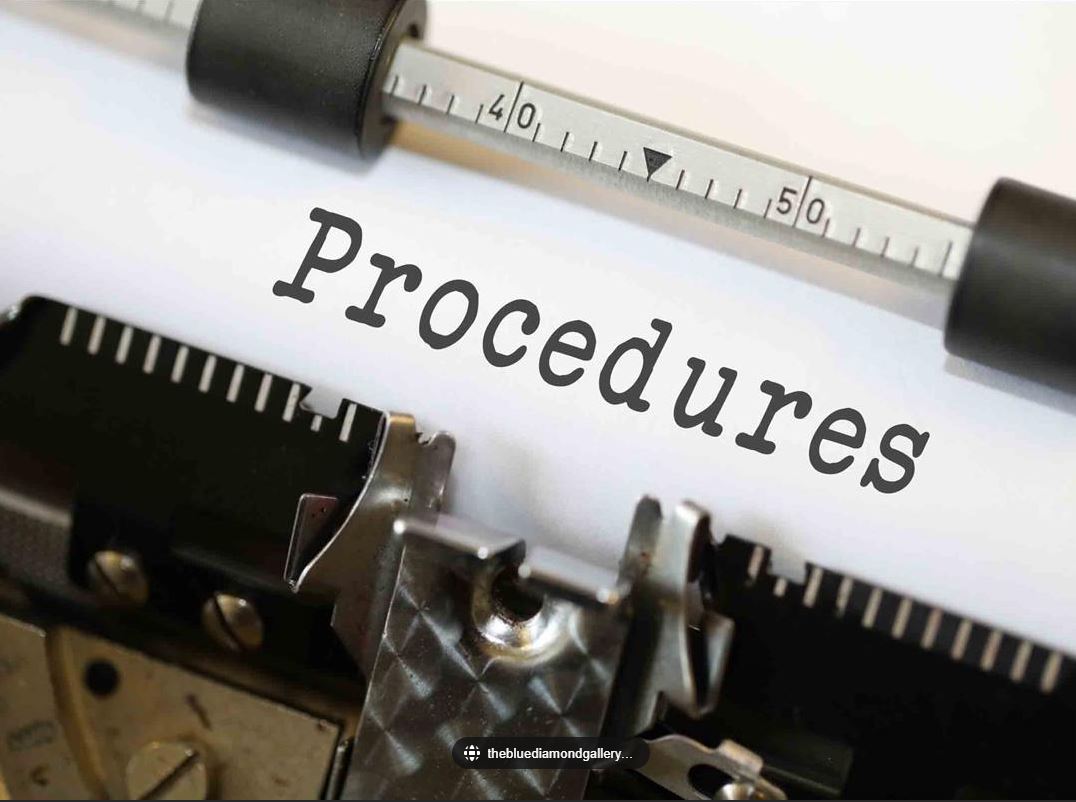 Typewriter typing the word Procedures