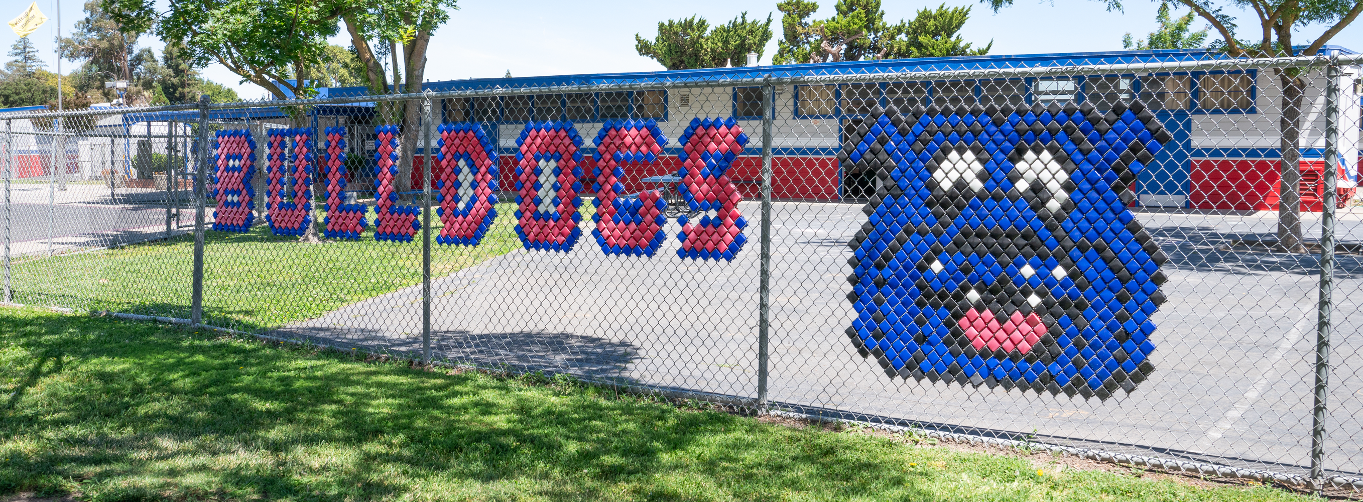 Beard Elementary School with gate decorations reading "Bulldogs" with a bulldog decoration