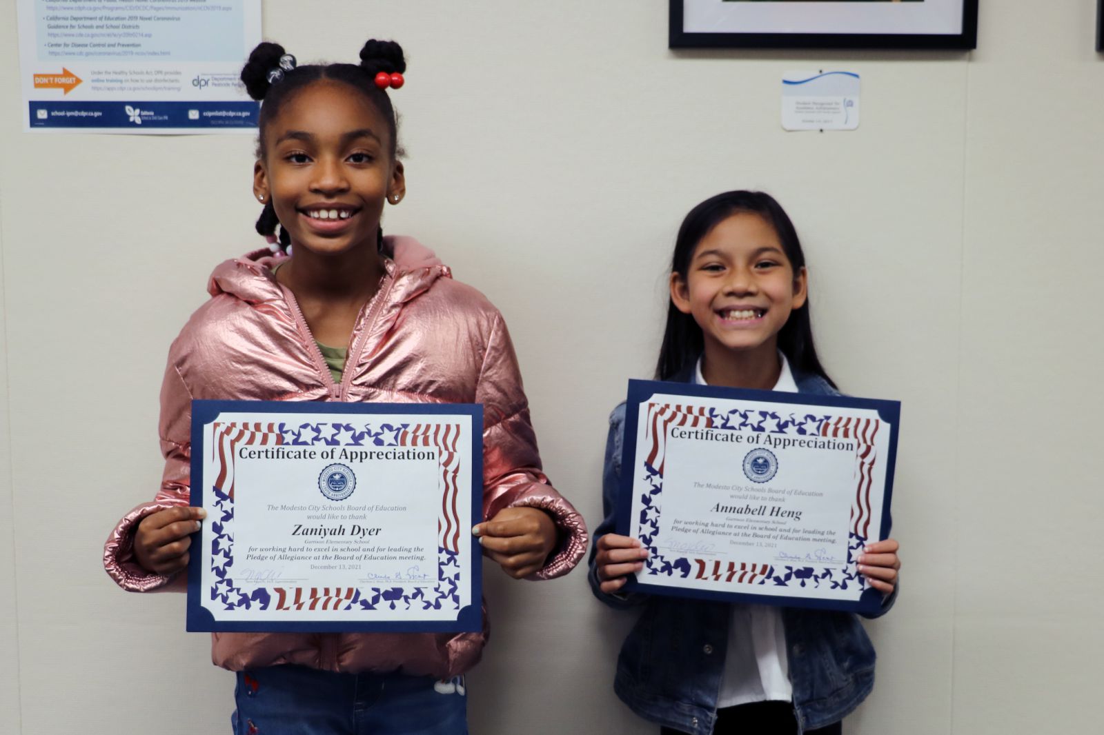 Anabelle Heng and Zaniyah Dyer posing for picture was certificates together