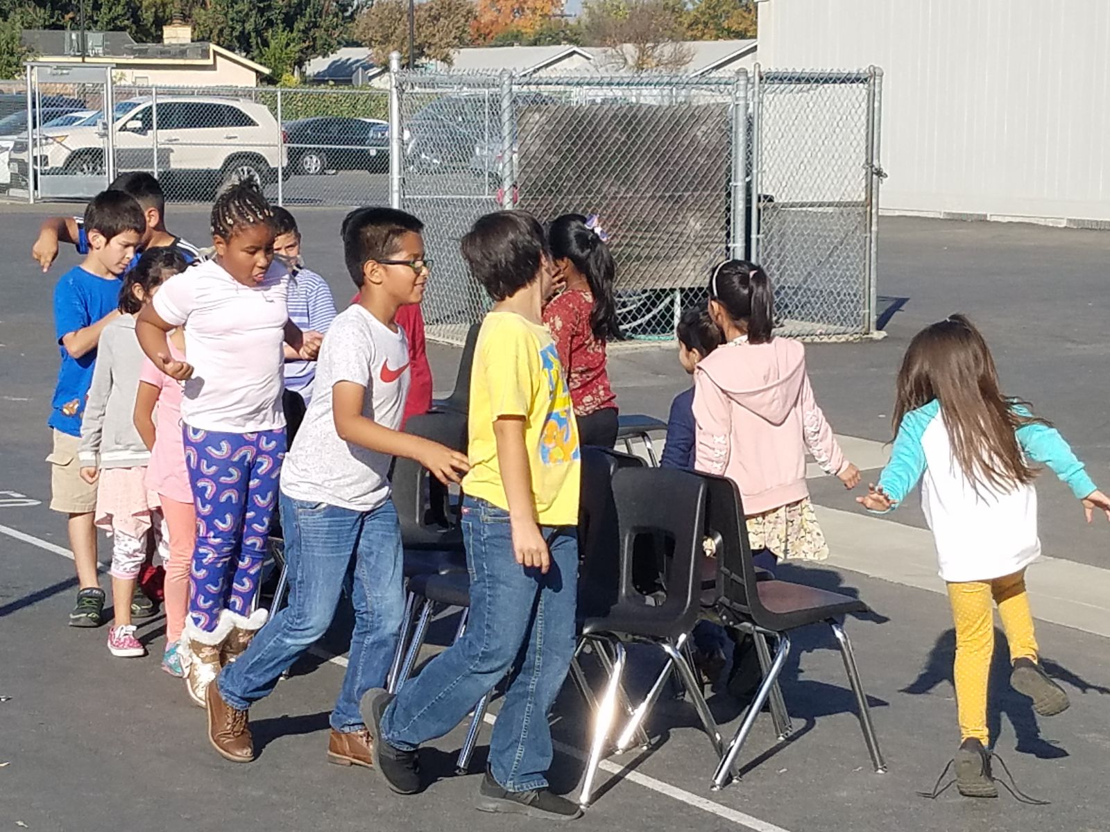 Students playing musical chairs