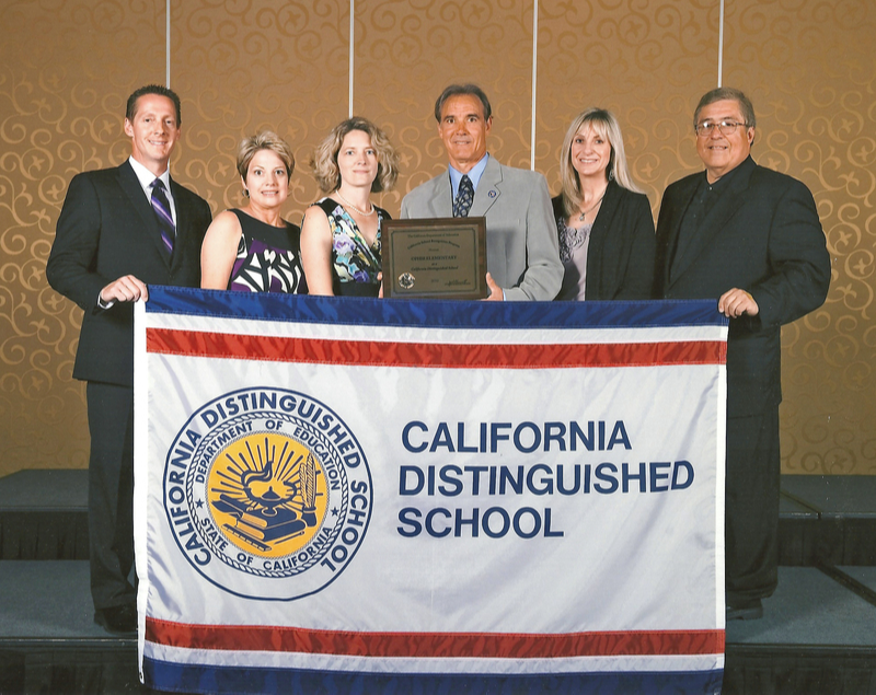 Mrs. Risley winning California Distinguished School Award.