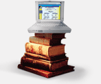 Laptop on top of a pile of books
