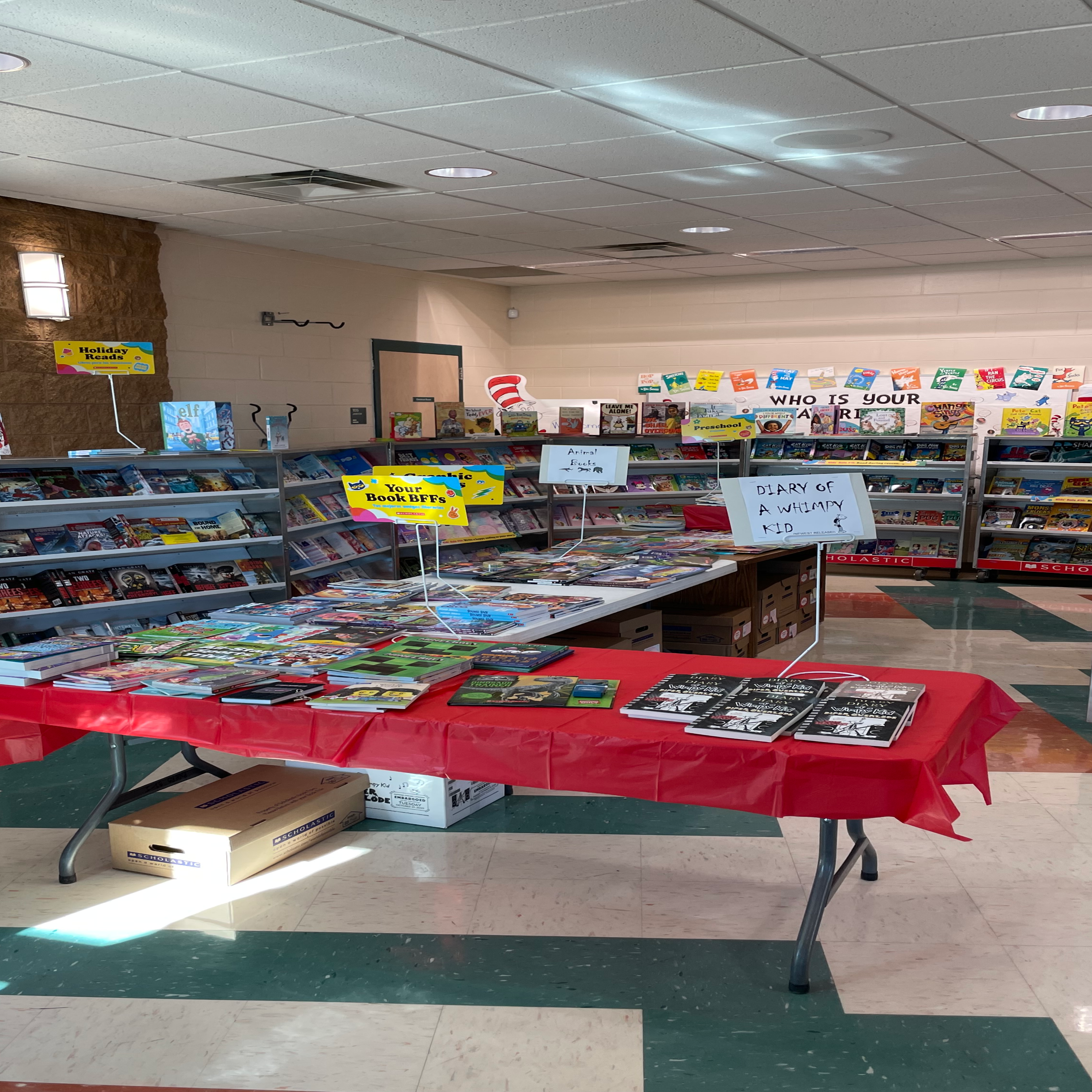 Image of book fair setup on tables and carts