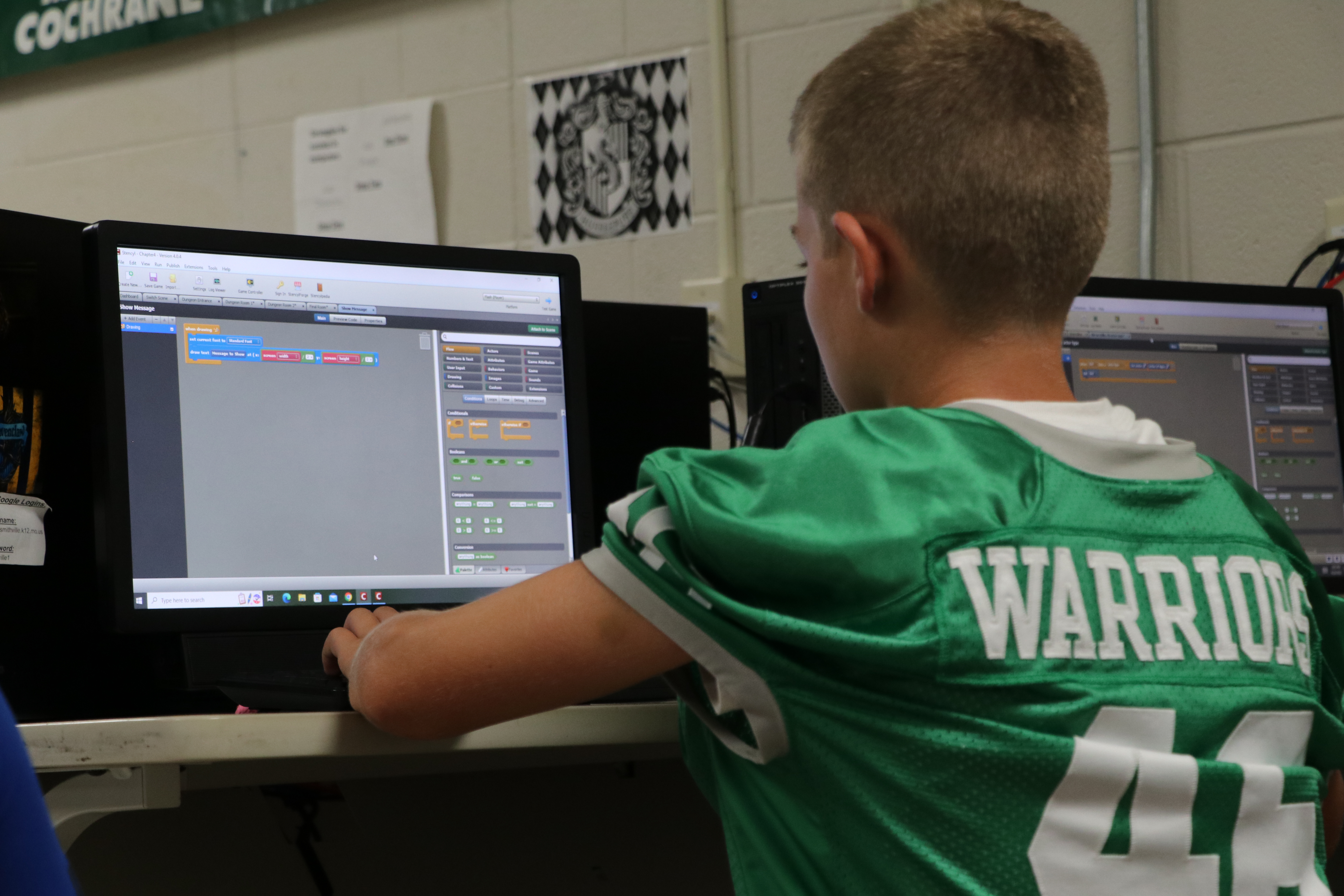 Middle School boy using computer