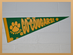 Green and yellow banner that says "Go Cougars!"