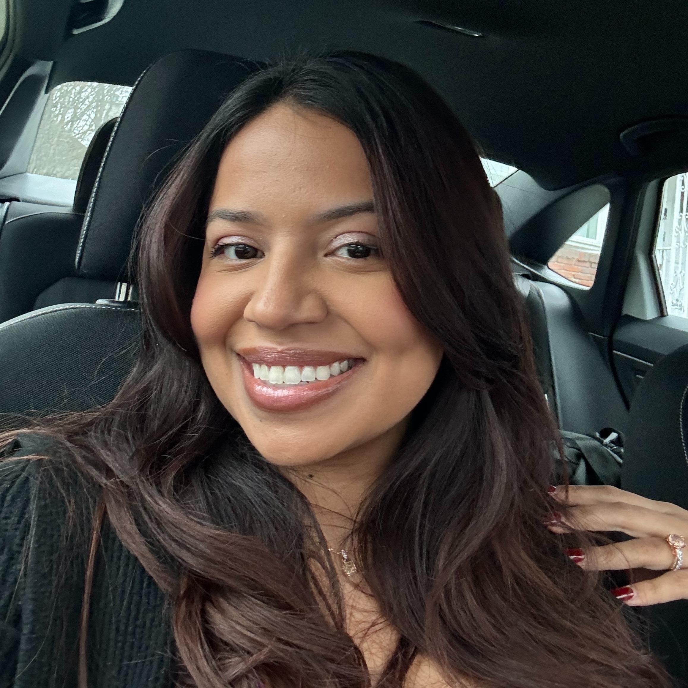 women smiling at the camera