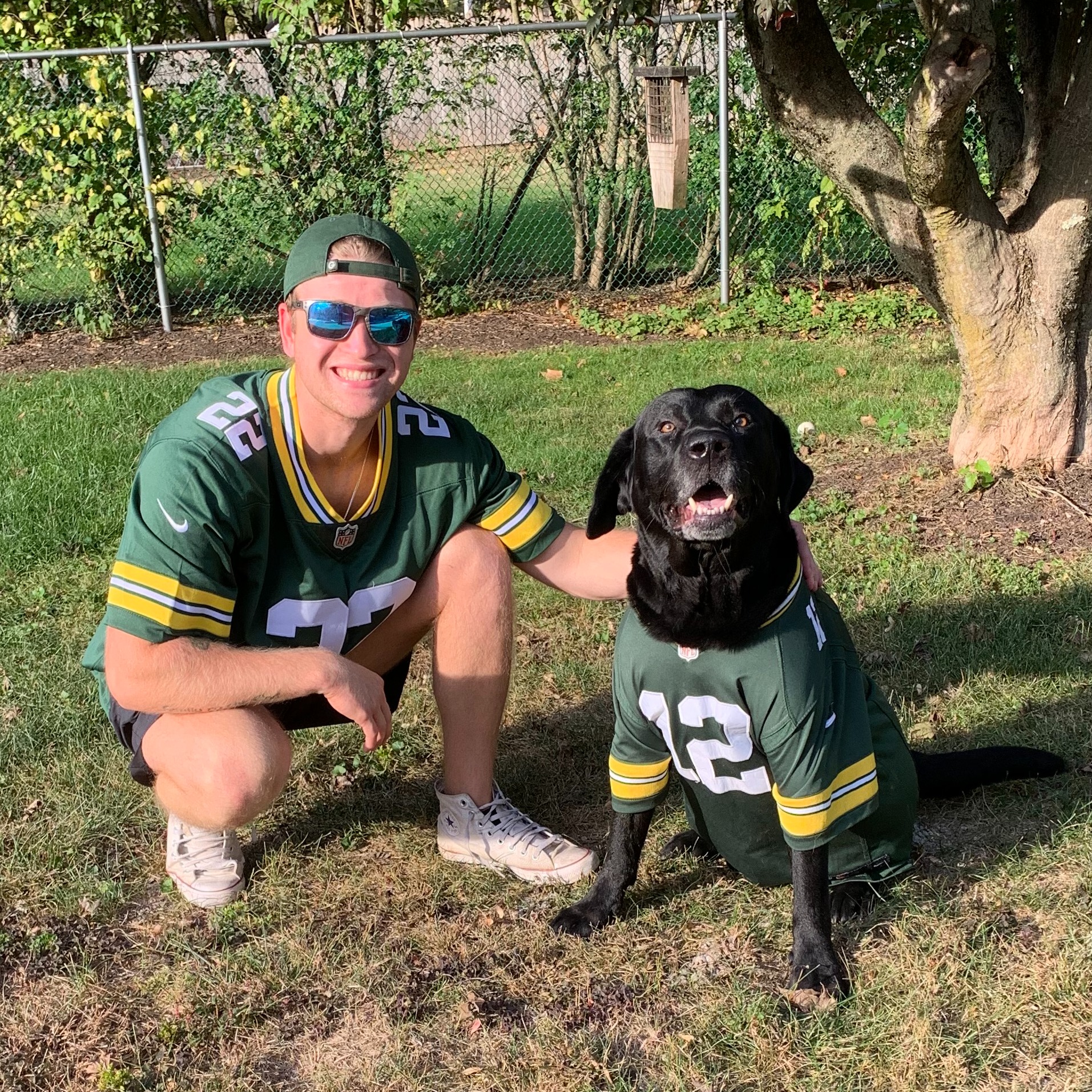 man ans his dog smiling for the camera
