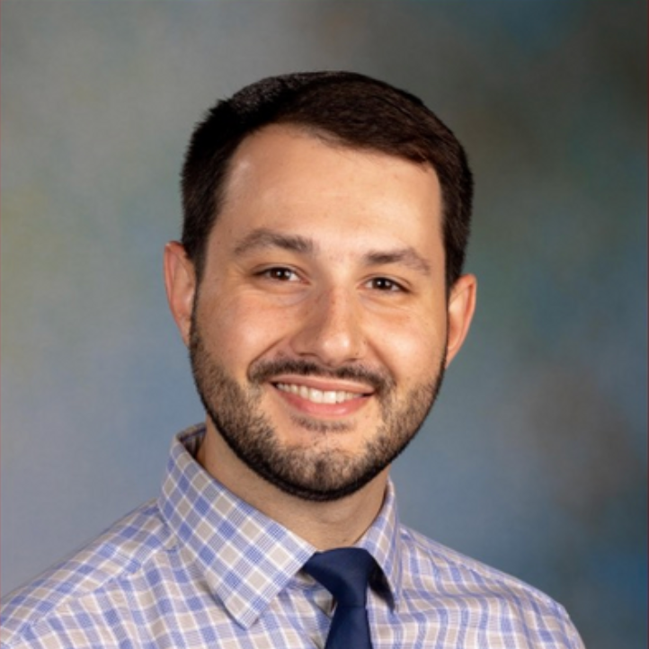 man smiling at the camera