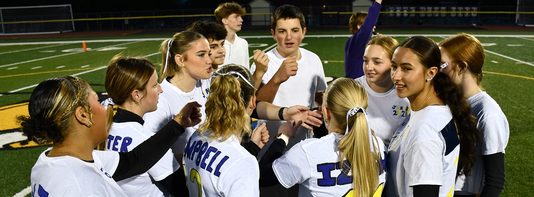 A group of students cheering.