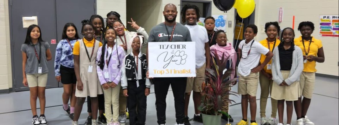 holding sign with kids