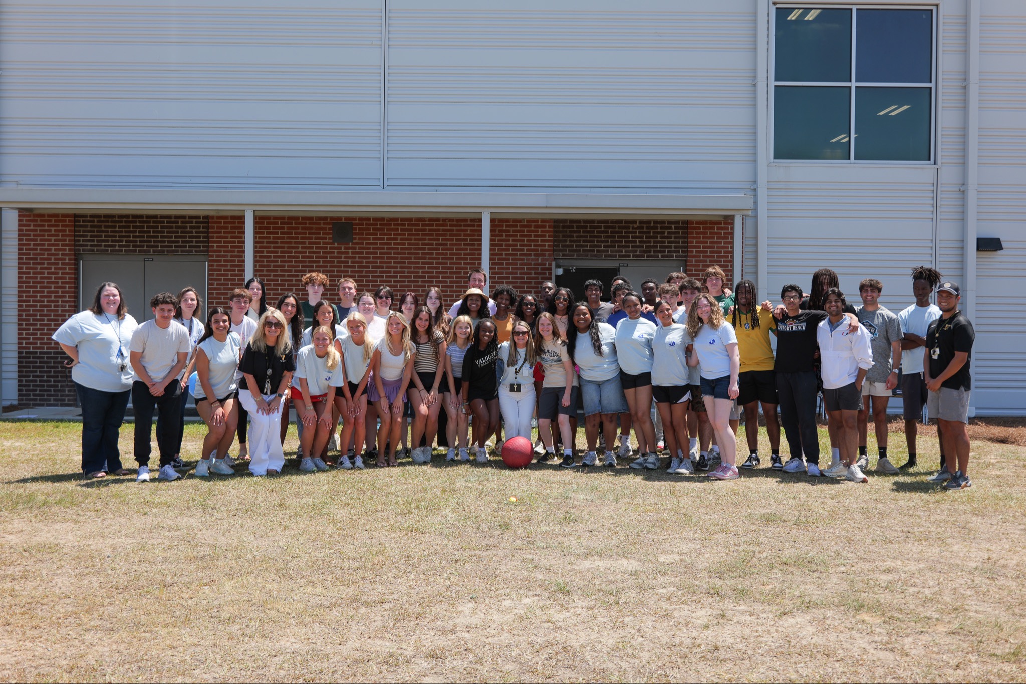 group photo of IB students and staff