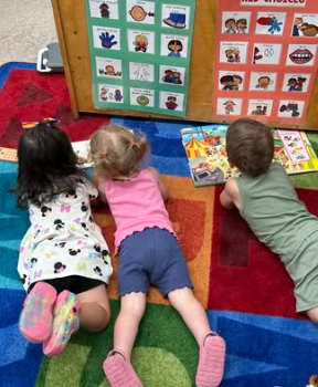 daycare children on digital interactive mat