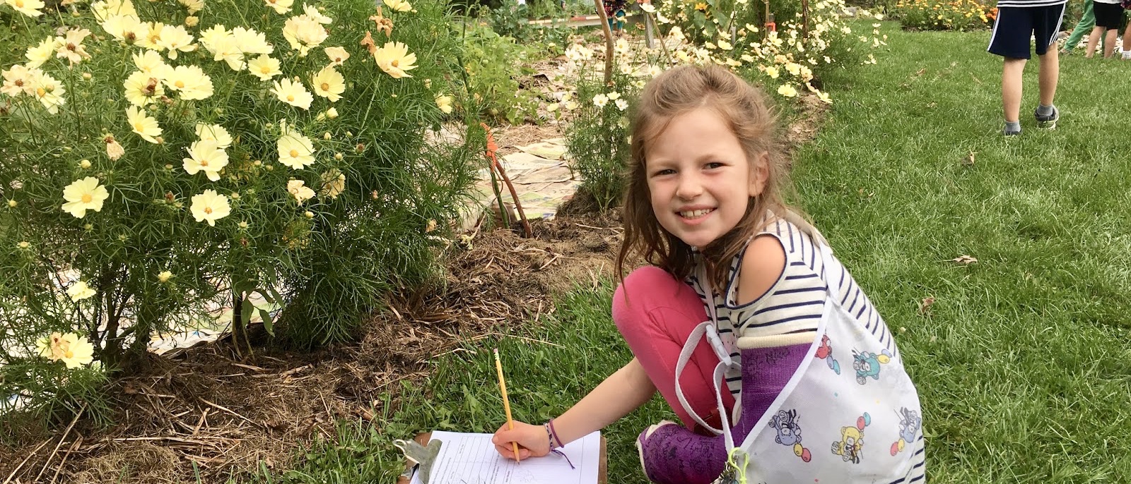 photo of student out in the garden