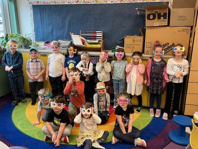 A kindergarten class wears 100-day glasses