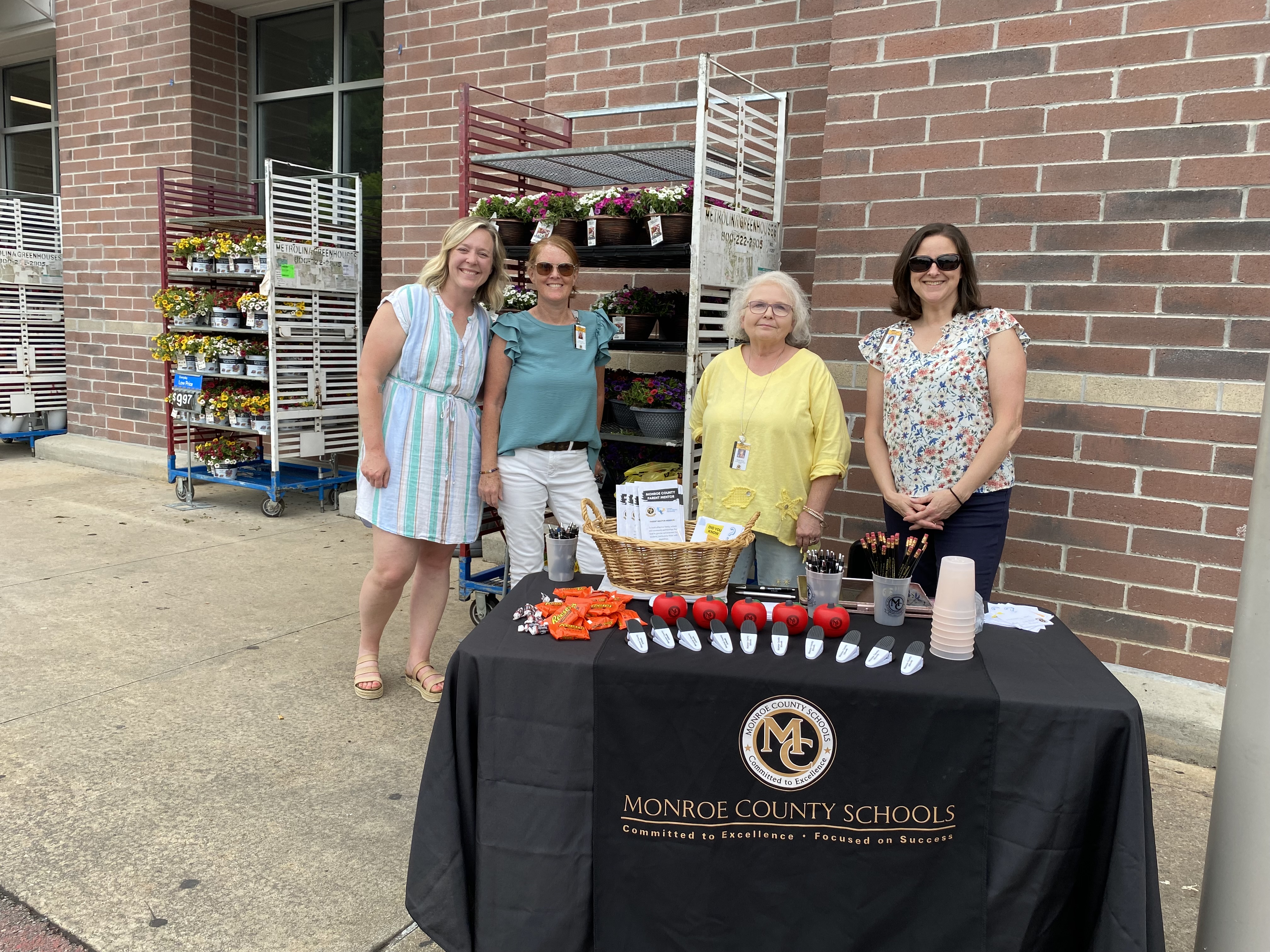 Monroe County Schools Department of Instructional Student Supports staff at Forsyth Walmart sharing information on Child Find.