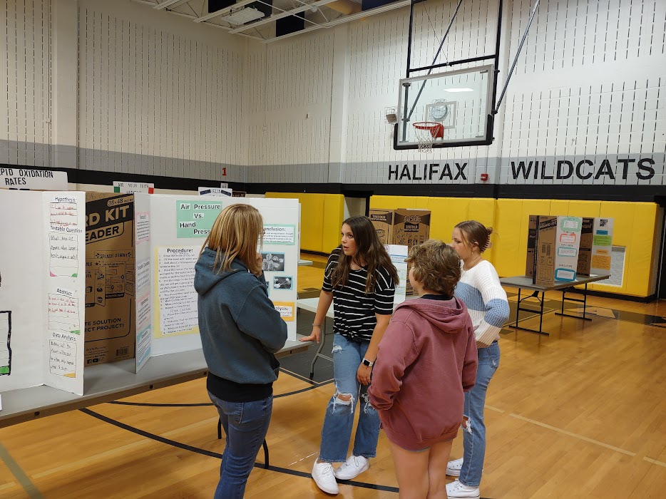 Aleigha talks about her project with Mrs. Frantz