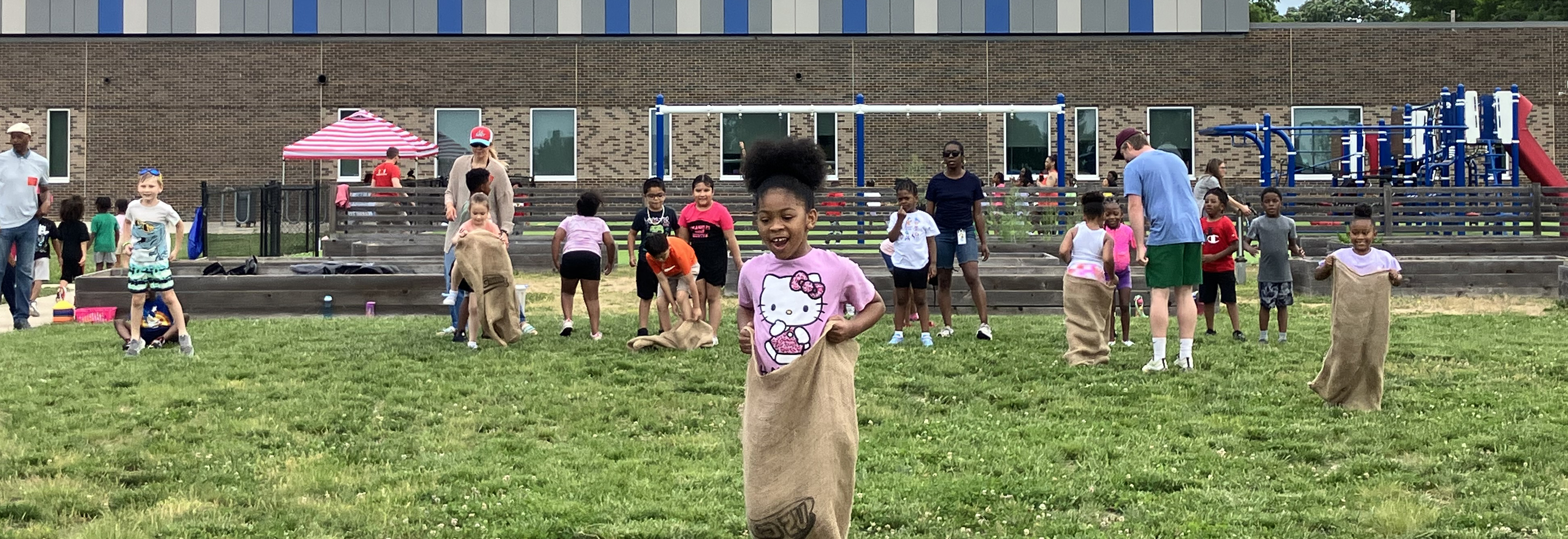 Indian Creek Elementary students and families participate in field day on the school playground.