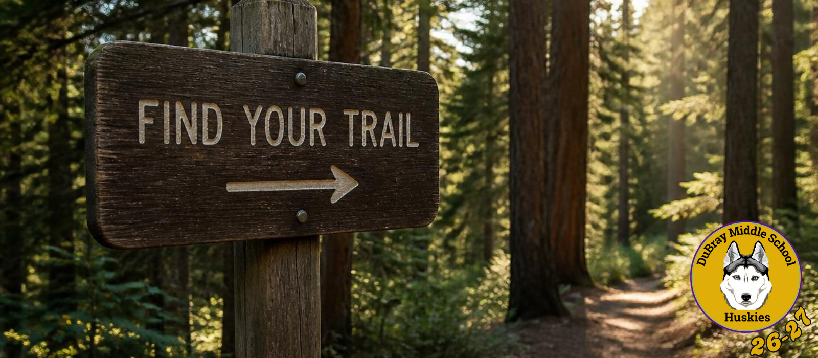 Photo of woods with a trail - Find Your Trail DMS 2026-2027