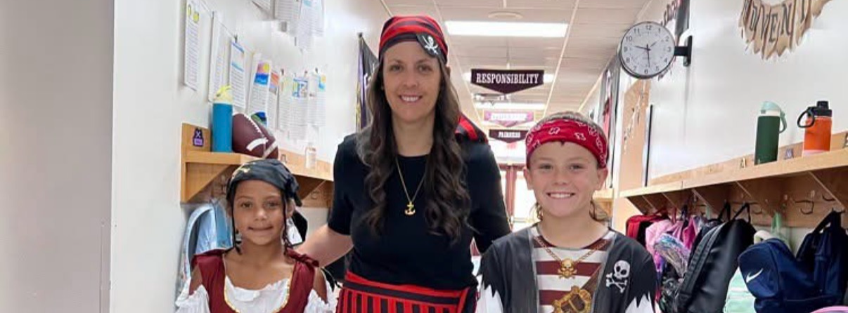 Student and Teacher Dressed as Pirates
