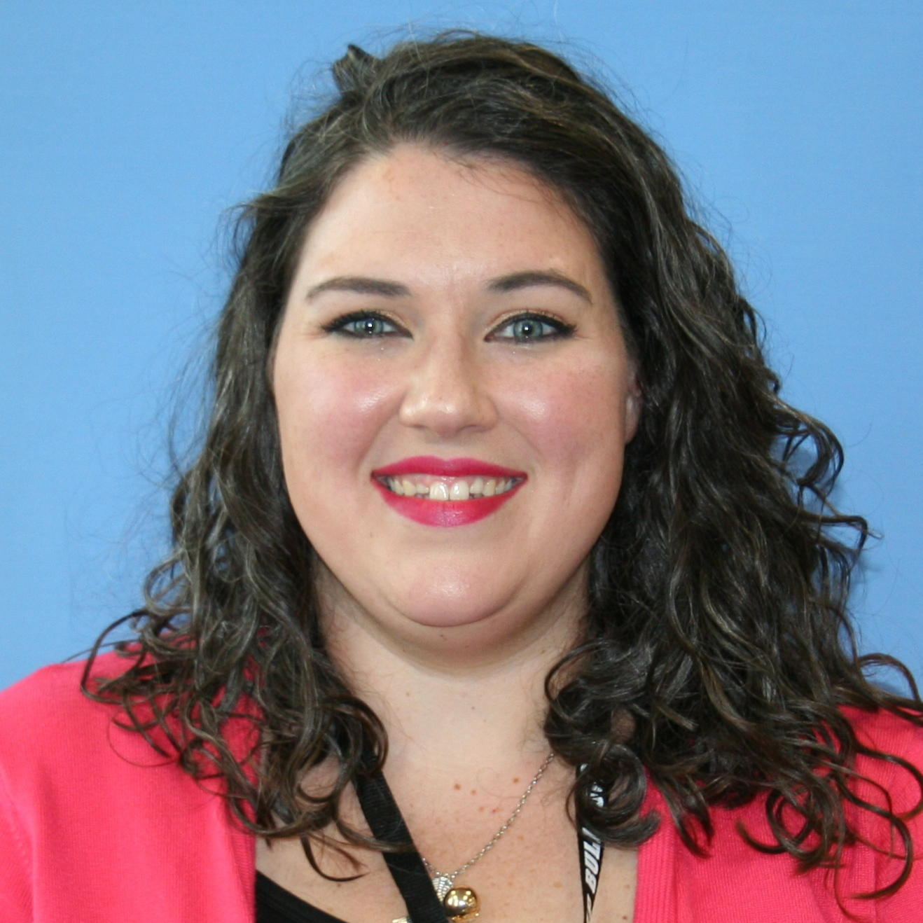 Amanda Bernard, media specialist in pink coat