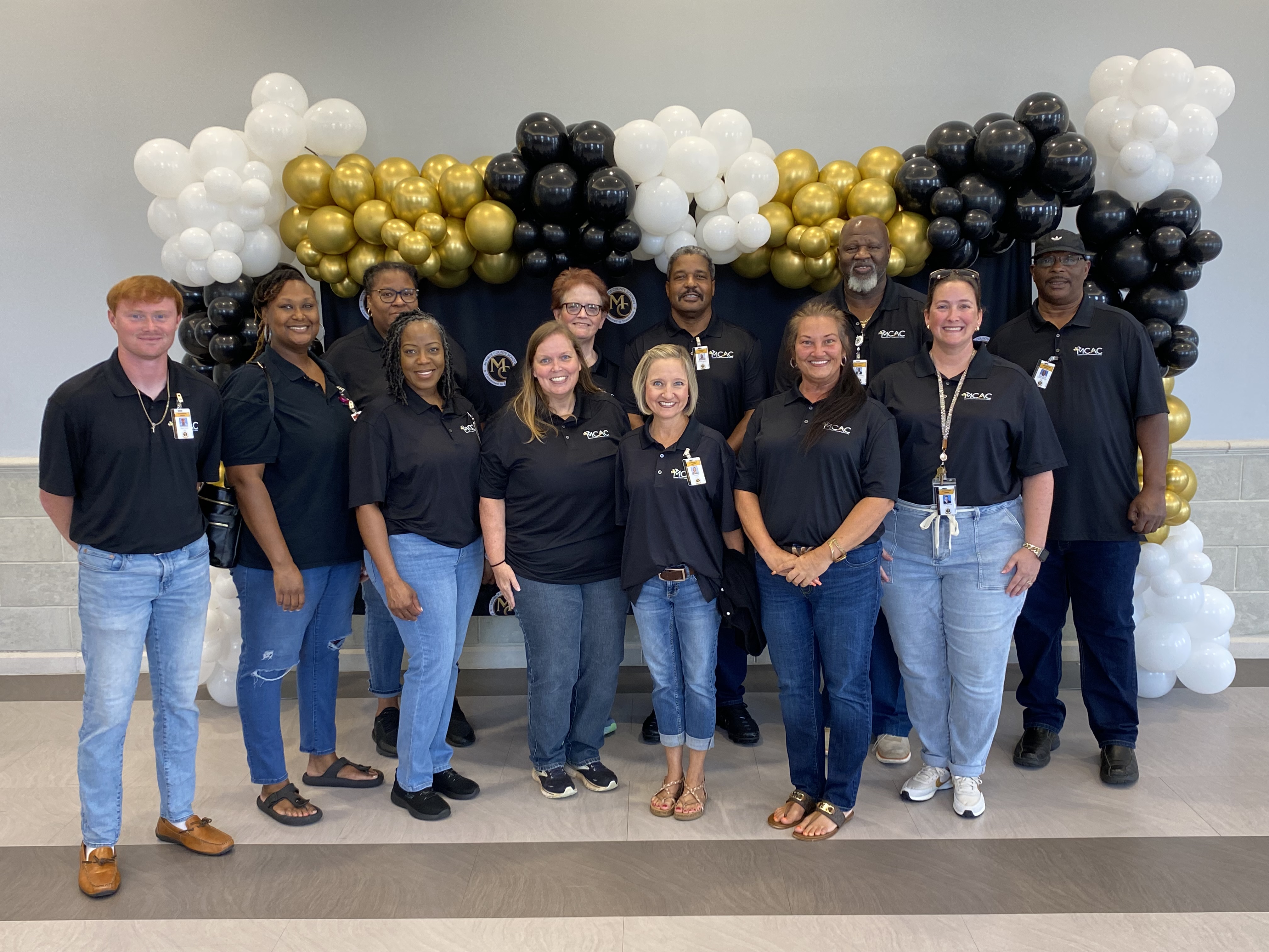 group of teachers in black shirts