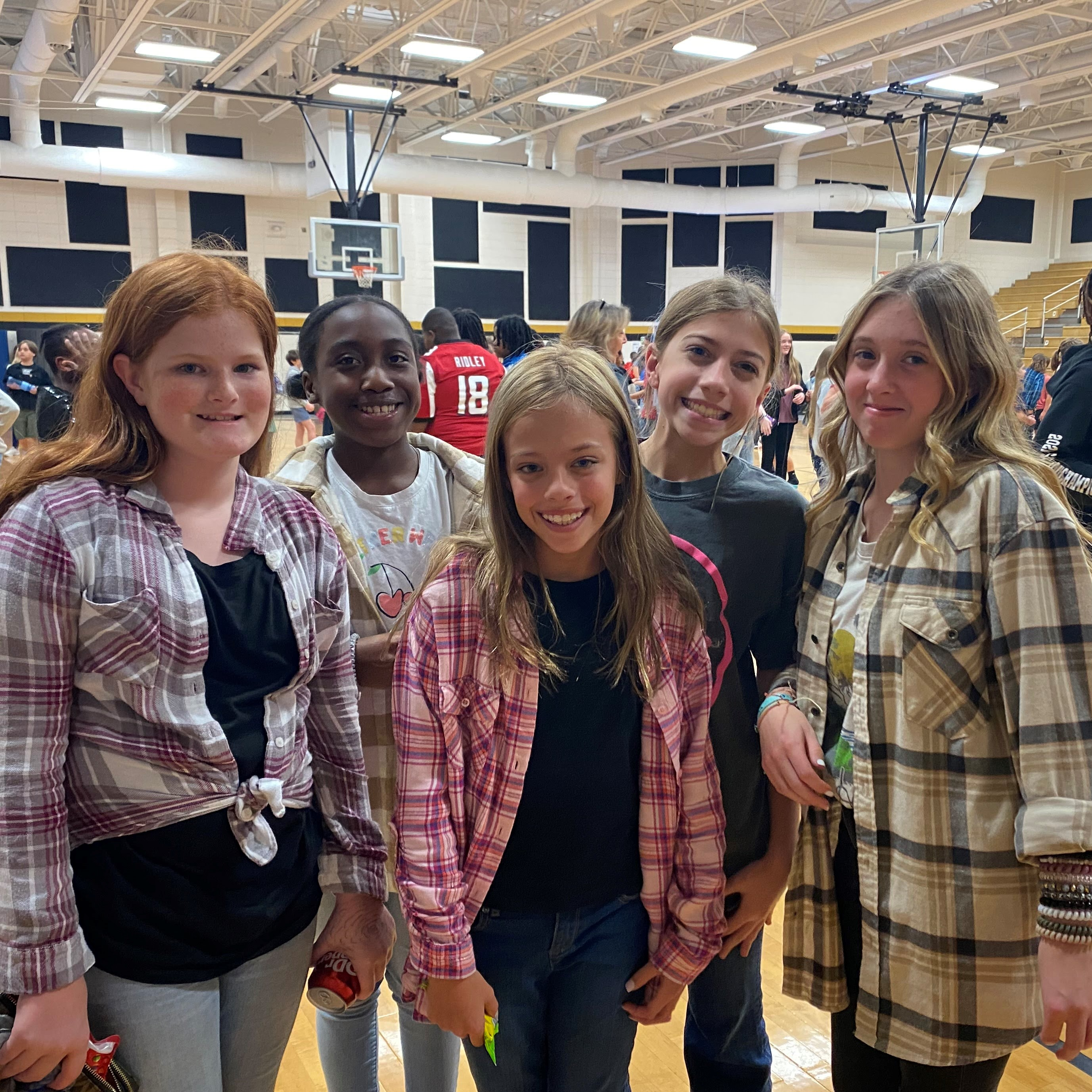 smiling students in flannel