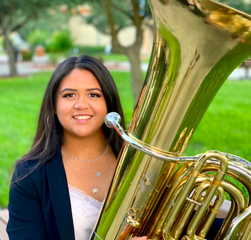 image of Olga Salazar holding a tuba