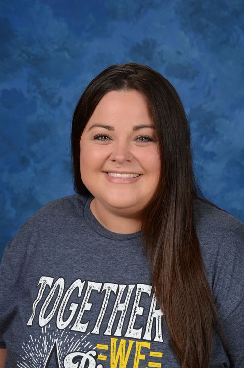 image of Courtney Morton in Rayburn t-shirt with blue background