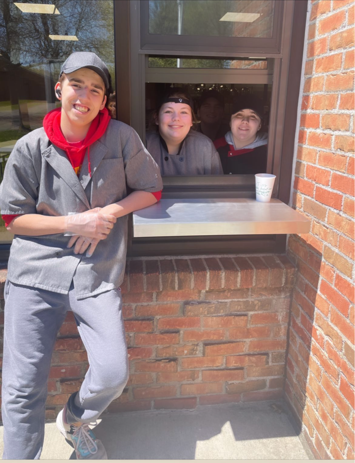 Food Service student serving coffee