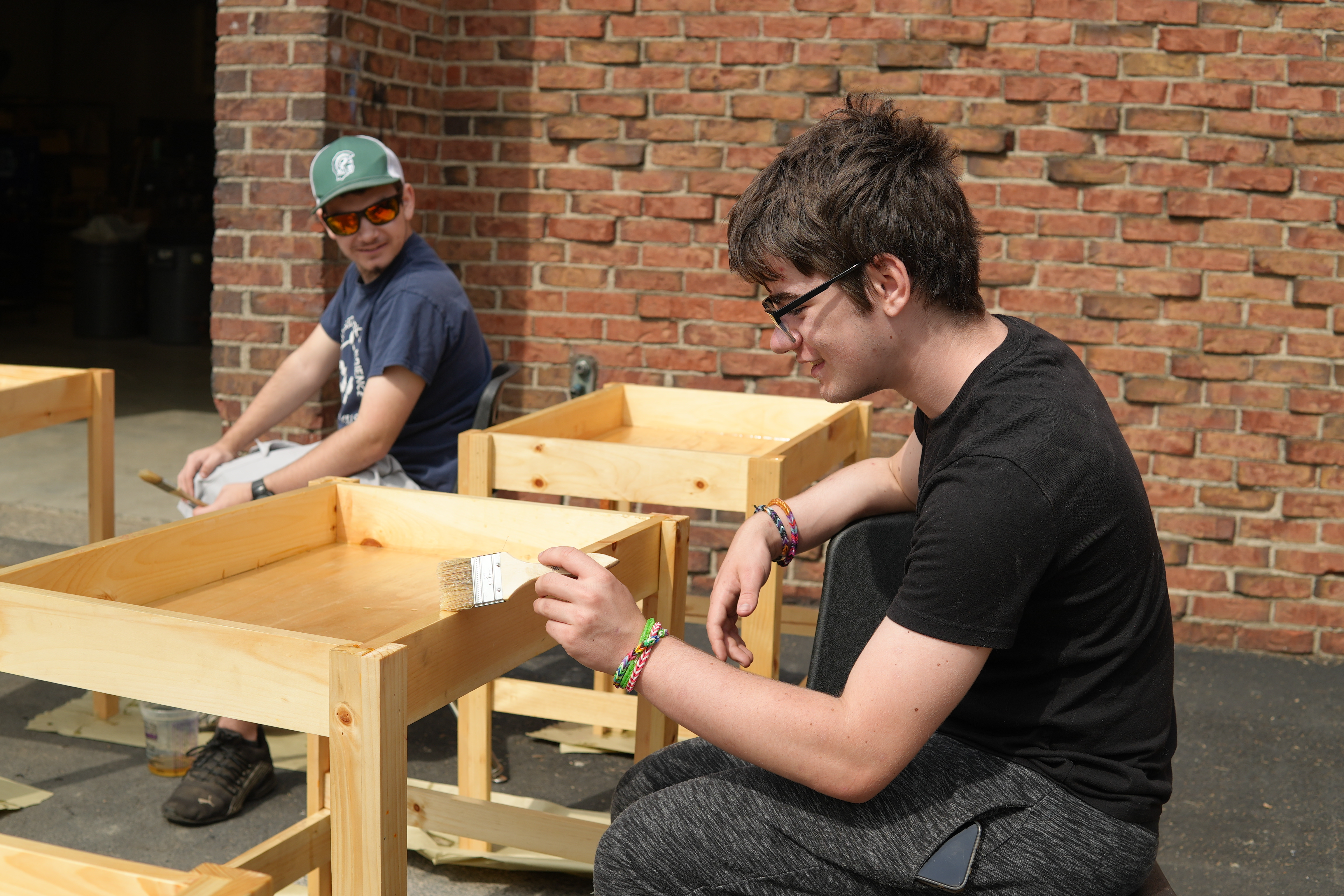 Outdoor Power student using saw