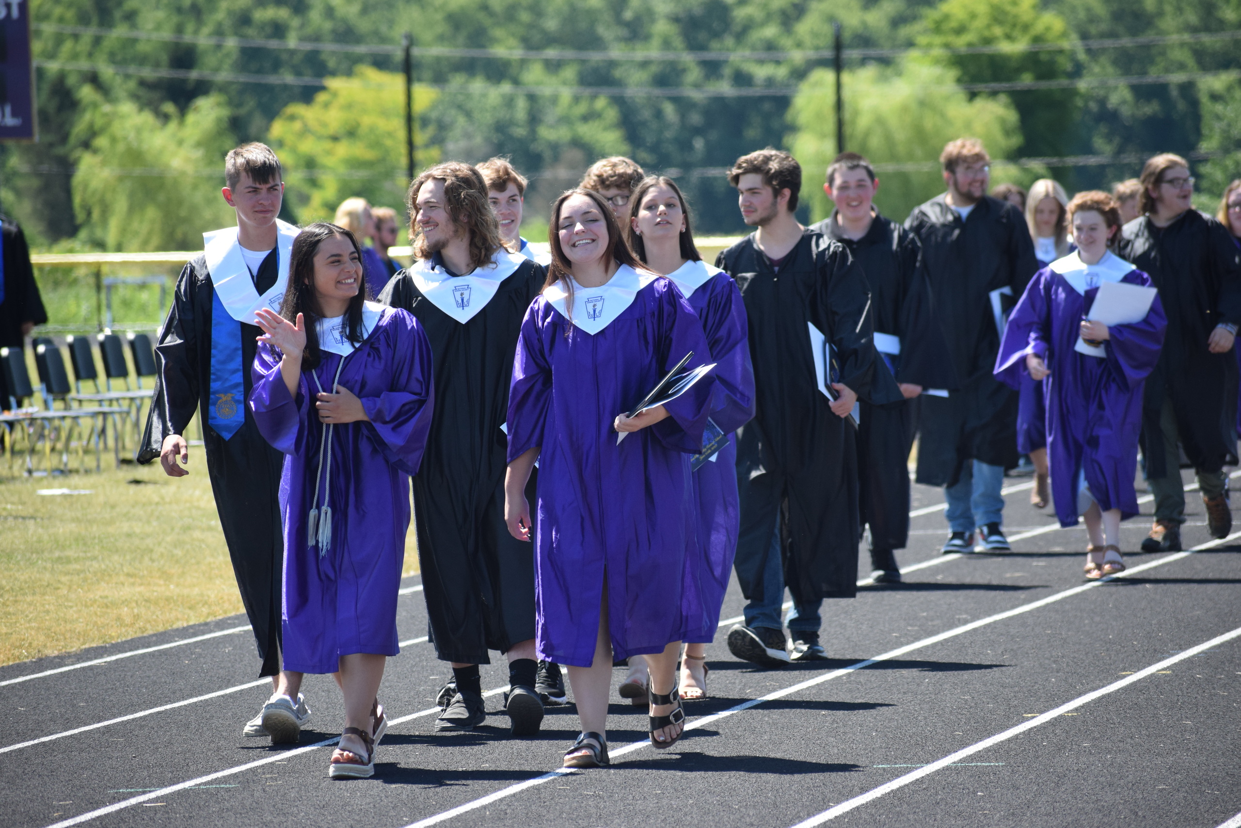 graduating students walking together