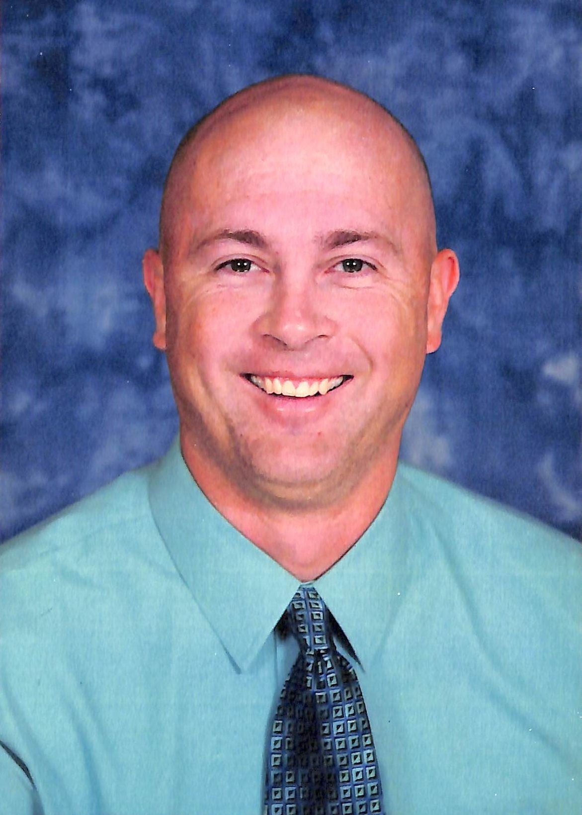 Adam Boettcher, Principal