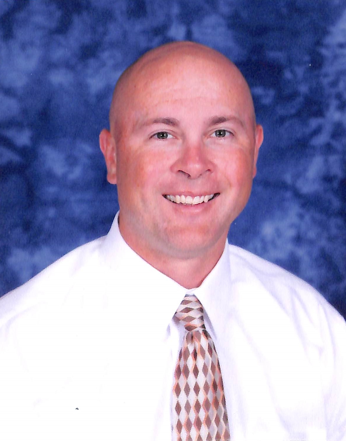 Adam Boettcher, Principal