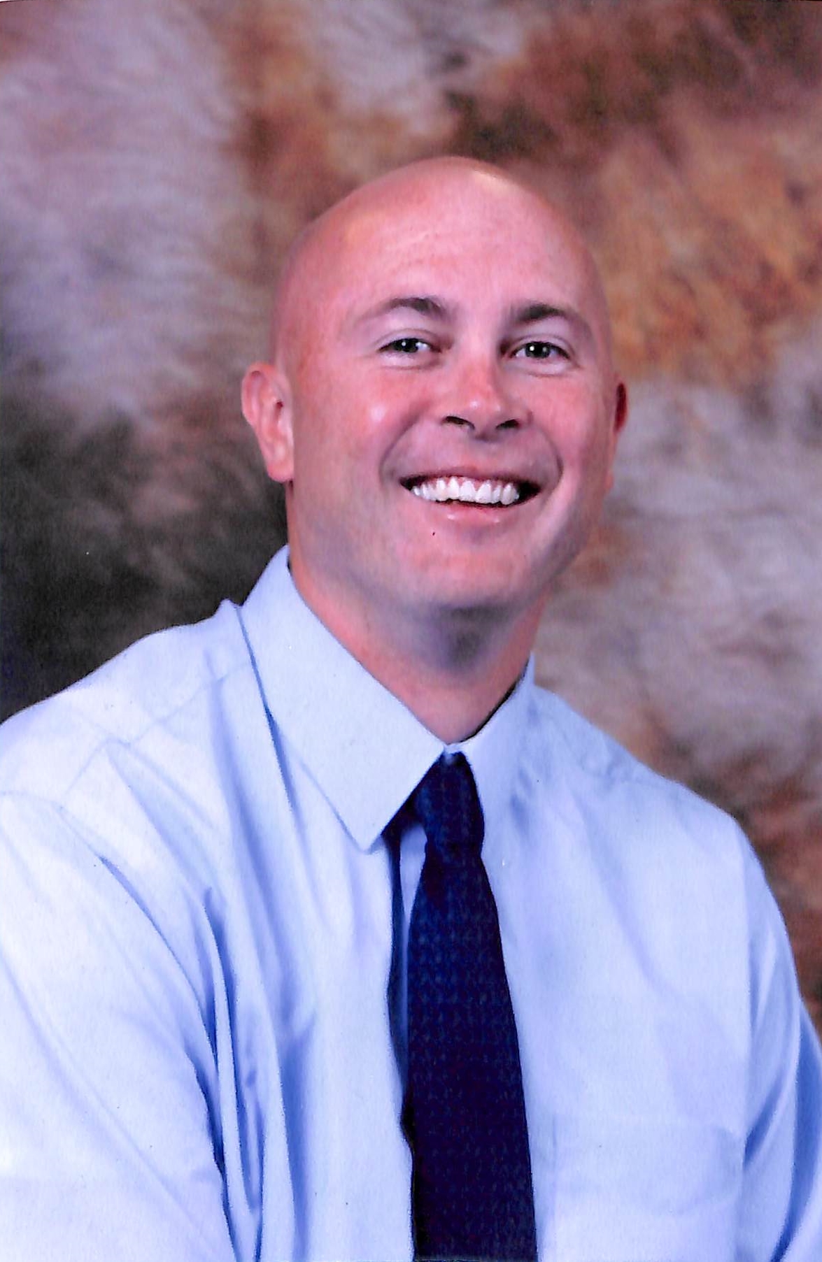 Adam Boettcher, Principal