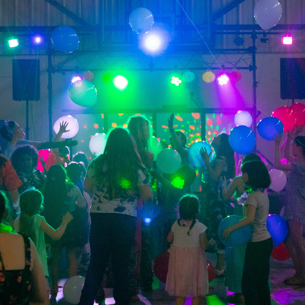 students dance at a party