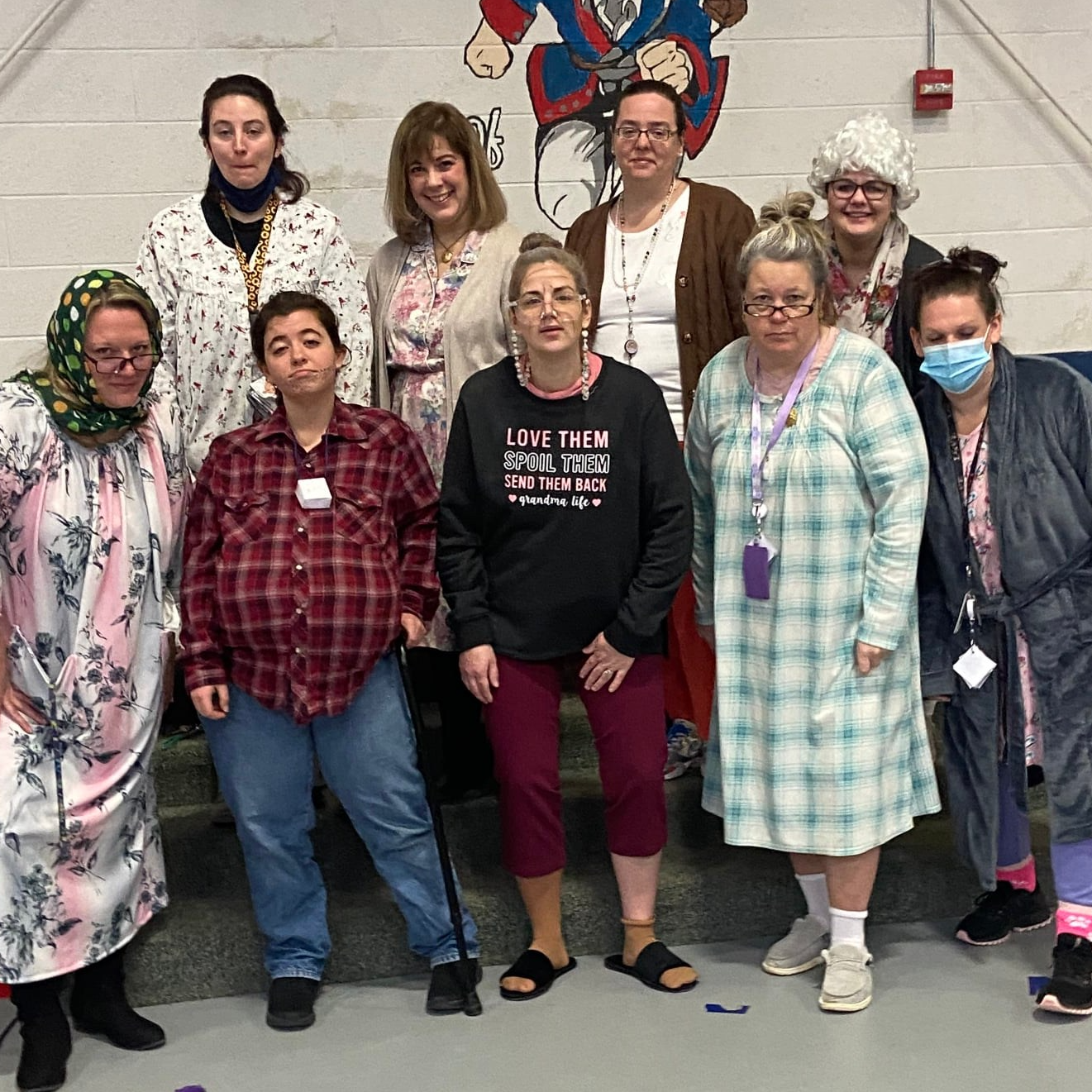 Teachers dressed for 100 days of school as older individuals