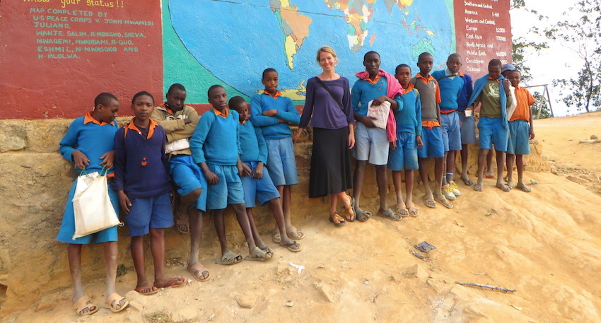 Teacher in South Africa with a group of students